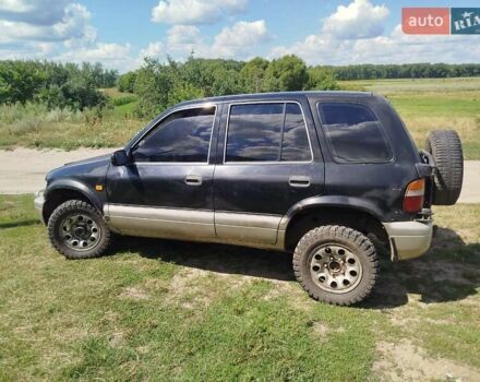 Черный Киа Sportage, объемом двигателя 2 л и пробегом 350 тыс. км за 3000 $, фото 5 на Automoto.ua