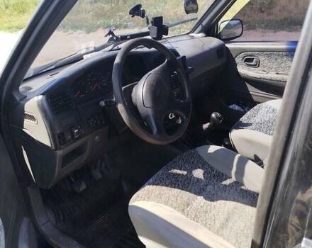 Черный Киа Sportage, объемом двигателя 2 л и пробегом 350 тыс. км за 3000 $, фото 2 на Automoto.ua