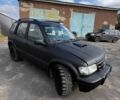 Черный Киа Sportage, объемом двигателя 2 л и пробегом 324 тыс. км за 2900 $, фото 1 на Automoto.ua
