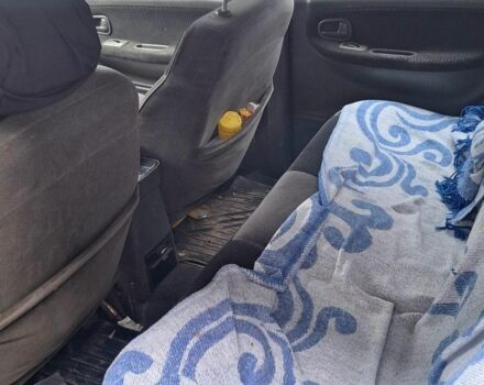 Черный Киа Sportage, объемом двигателя 2 л и пробегом 220 тыс. км за 2000 $, фото 2 на Automoto.ua