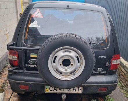 Черный Киа Sportage, объемом двигателя 2 л и пробегом 220 тыс. км за 2000 $, фото 3 на Automoto.ua