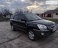 Черный Киа Sportage, объемом двигателя 2 л и пробегом 300 тыс. км за 8000 $, фото 6 на Automoto.ua