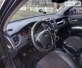 Черный Киа Sportage, объемом двигателя 2 л и пробегом 300 тыс. км за 8000 $, фото 1 на Automoto.ua