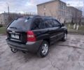 Чорний Кіа Sportage, об'ємом двигуна 2 л та пробігом 300 тис. км за 8000 $, фото 3 на Automoto.ua