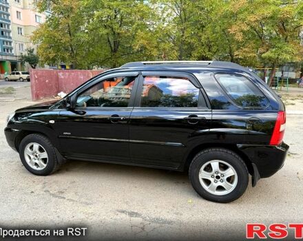 Черный Киа Sportage, объемом двигателя 2 л и пробегом 205 тыс. км за 7500 $, фото 1 на Automoto.ua