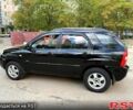 Черный Киа Sportage, объемом двигателя 2 л и пробегом 205 тыс. км за 7500 $, фото 1 на Automoto.ua