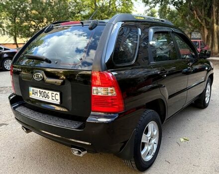 Черный Киа Sportage, объемом двигателя 2 л и пробегом 205 тыс. км за 7500 $, фото 2 на Automoto.ua