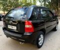 Черный Киа Sportage, объемом двигателя 2 л и пробегом 205 тыс. км за 7500 $, фото 2 на Automoto.ua