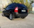 Черный Киа Sportage, объемом двигателя 2 л и пробегом 140 тыс. км за 9250 $, фото 1 на Automoto.ua