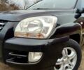 Черный Киа Sportage, объемом двигателя 2 л и пробегом 300 тыс. км за 7900 $, фото 2 на Automoto.ua