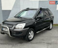 Черный Киа Sportage, объемом двигателя 2 л и пробегом 370 тыс. км за 6500 $, фото 1 на Automoto.ua