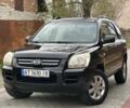 Черный Киа Sportage, объемом двигателя 2 л и пробегом 262 тыс. км за 5350 $, фото 1 на Automoto.ua