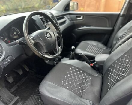 Черный Киа Sportage, объемом двигателя 2 л и пробегом 262 тыс. км за 5350 $, фото 14 на Automoto.ua