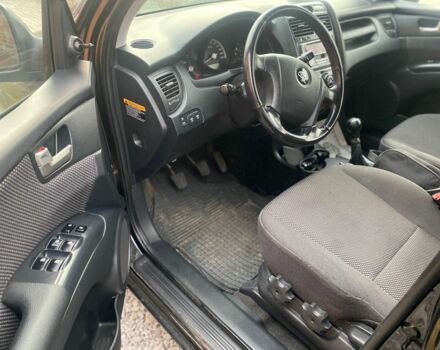 Черный Киа Sportage, объемом двигателя 2 л и пробегом 161 тыс. км за 4300 $, фото 7 на Automoto.ua