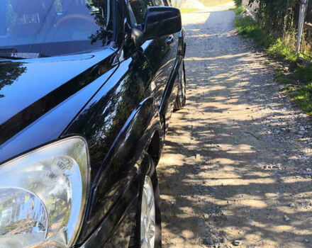 Черный Киа Sportage, объемом двигателя 1.99 л и пробегом 207 тыс. км за 7450 $, фото 3 на Automoto.ua