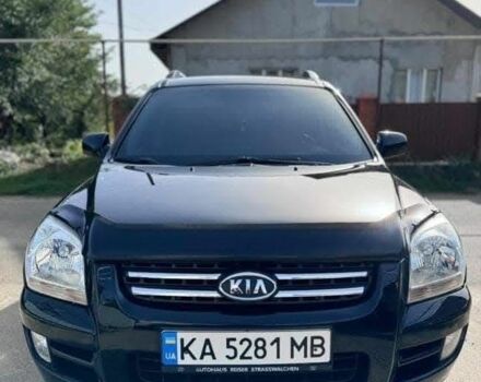 Черный Киа Sportage, объемом двигателя 2 л и пробегом 199 тыс. км за 6999 $, фото 1 на Automoto.ua
