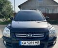 Черный Киа Sportage, объемом двигателя 2 л и пробегом 199 тыс. км за 6999 $, фото 1 на Automoto.ua