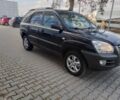 Черный Киа Sportage, объемом двигателя 2 л и пробегом 380 тыс. км за 4400 $, фото 1 на Automoto.ua