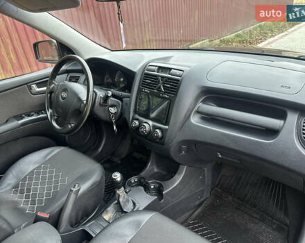 Черный Киа Sportage, объемом двигателя 1.98 л и пробегом 262 тыс. км за 5350 $, фото 17 на Automoto.ua