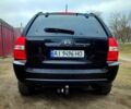 Черный Киа Sportage, объемом двигателя 2 л и пробегом 300 тыс. км за 7900 $, фото 4 на Automoto.ua