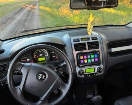 Черный Киа Sportage, объемом двигателя 2 л и пробегом 199 тыс. км за 6999 $, фото 7 на Automoto.ua