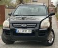 Черный Киа Sportage, объемом двигателя 2 л и пробегом 262 тыс. км за 5350 $, фото 2 на Automoto.ua