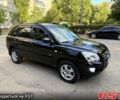 Черный Киа Sportage, объемом двигателя 2 л и пробегом 205 тыс. км за 7500 $, фото 1 на Automoto.ua
