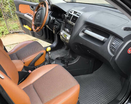 Черный Киа Sportage, объемом двигателя 1.99 л и пробегом 207 тыс. км за 7450 $, фото 11 на Automoto.ua