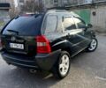 Чорний Кіа Sportage, об'ємом двигуна 2 л та пробігом 140 тис. км за 9250 $, фото 6 на Automoto.ua