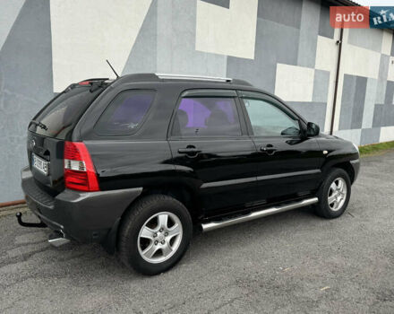 Черный Киа Sportage, объемом двигателя 2 л и пробегом 370 тыс. км за 6500 $, фото 8 на Automoto.ua