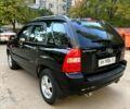 Черный Киа Sportage, объемом двигателя 2 л и пробегом 205 тыс. км за 7500 $, фото 4 на Automoto.ua