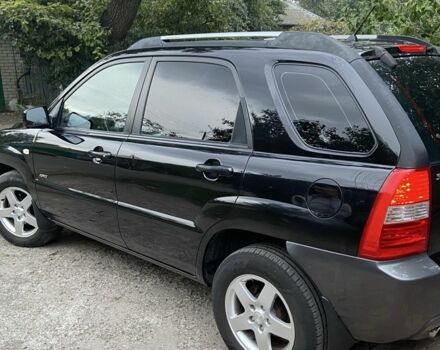 Чорний Кіа Sportage, об'ємом двигуна 2 л та пробігом 227 тис. км за 6900 $, фото 6 на Automoto.ua