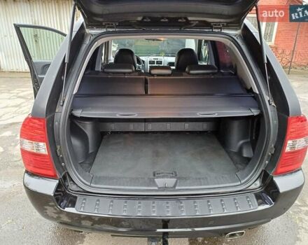 Черный Киа Sportage, объемом двигателя 2 л и пробегом 160 тыс. км за 7777 $, фото 25 на Automoto.ua