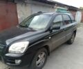 Черный Киа Sportage, объемом двигателя 2 л и пробегом 307 тыс. км за 4800 $, фото 2 на Automoto.ua
