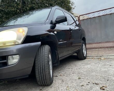 Чорний Кіа Sportage, об'ємом двигуна 2 л та пробігом 227 тис. км за 6900 $, фото 2 на Automoto.ua