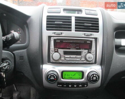 Черный Киа Sportage, объемом двигателя 2 л и пробегом 213 тыс. км за 7700 $, фото 12 на Automoto.ua