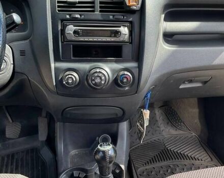 Чорний Кіа Sportage, об'ємом двигуна 1.98 л та пробігом 200 тис. км за 7900 $, фото 15 на Automoto.ua