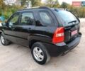 Чорний Кіа Sportage, об'ємом двигуна 2 л та пробігом 150 тис. км за 7000 $, фото 13 на Automoto.ua