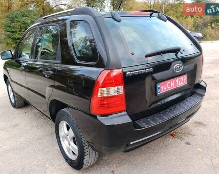 Чорний Кіа Sportage, об'ємом двигуна 2 л та пробігом 150 тис. км за 7000 $, фото 12 на Automoto.ua