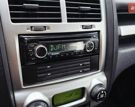 Чорний Кіа Sportage, об'ємом двигуна 2 л та пробігом 172 тис. км за 7999 $, фото 44 на Automoto.ua