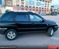 Черный Киа Sportage, объемом двигателя 2 л и пробегом 196 тыс. км за 7500 $, фото 1 на Automoto.ua