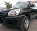 Чорний Кіа Sportage, об'ємом двигуна 2 л та пробігом 150 тис. км за 7000 $, фото 23 на Automoto.ua