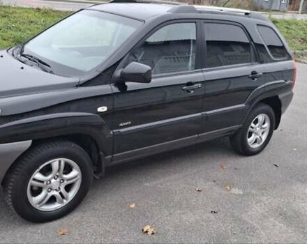 Черный Киа Sportage, объемом двигателя 2 л и пробегом 170 тыс. км за 8700 $, фото 3 на Automoto.ua