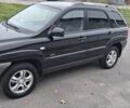 Черный Киа Sportage, объемом двигателя 2 л и пробегом 170 тыс. км за 8700 $, фото 3 на Automoto.ua