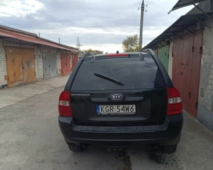Черный Киа Sportage, объемом двигателя 2 л и пробегом 307 тыс. км за 4800 $, фото 3 на Automoto.ua