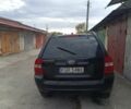 Черный Киа Sportage, объемом двигателя 2 л и пробегом 307 тыс. км за 4800 $, фото 3 на Automoto.ua