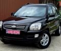 Чорний Кіа Sportage, об'ємом двигуна 2 л та пробігом 172 тис. км за 7999 $, фото 4 на Automoto.ua