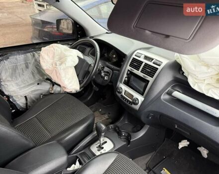 Черный Киа Sportage, объемом двигателя 1.99 л и пробегом 219 тыс. км за 3300 $, фото 14 на Automoto.ua