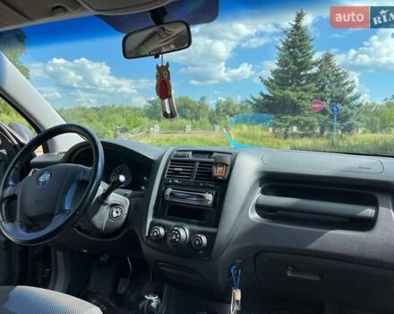 Чорний Кіа Sportage, об'ємом двигуна 1.98 л та пробігом 200 тис. км за 7900 $, фото 12 на Automoto.ua