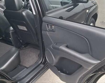 Черный Киа Sportage, объемом двигателя 2 л и пробегом 170 тыс. км за 8700 $, фото 17 на Automoto.ua